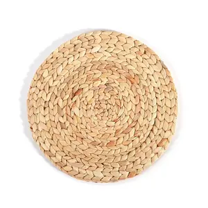 Commercio all'ingrosso personalizzato ecologico fatto a mano naturale rotondo rattan buccia di mais giacinto d'acqua resistente al calore tovaglietta sottobicchiere portatovagliolo