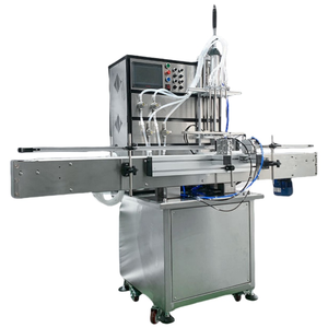 Machines de remplissage automatiques Yunqingtech à 4 têtes pour sauce chili, pâte, shampoing, savon, bouteilles en plastique, jus d'orange, miel, parfum - Product Image 1