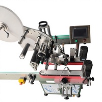 Applicateur d'étiquettes d'autocollant adhésif de machine d'étiquetage de pagination de côté supérieur de sac d'aluminium de vide automatique