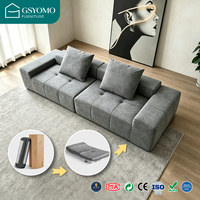 Canapé d'angle modulable en tissu style capitonné moderne, sans structure, compressé sous vide, pour salon