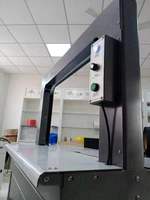 Machine d'emballage à sangles PP entièrement automatique électrique de haute qualité 12 mm avec moteur PLC pour l'emballage de produits alimentaires, de boissons, de textiles, de boîtes et de cartons
