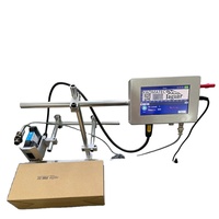Machine de codage automatique en ligne YAOMATEC 12,7 mm pour l'impression de dates et de données variables sur les boîtes en plastique.