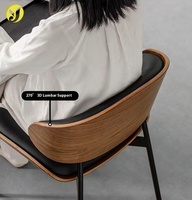 Chaise de salle à manger en cuir noir de style nordique avec pieds en métal haut de gamme et dossier