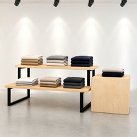 Table de présentation en bois à deux niveaux, noire, avec pieds en U, présentoir de vêtements pliable pour îlot commercial, socle pour logo, vente en gros
