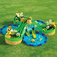 Parc aquatique gonflable commercial à thème abeilles en PVC avec toboggan multi-carrés et garantie de 3 ans pour les centres de villégiature estivaux