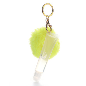 Vendita calda Clear Lip Oil Gloss simpatici bambini idratante lucidalabbra con Macaron Puff Ball Keychain Makeup - Product Image 6