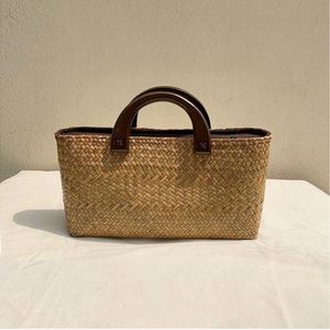 2025 Summer Hot Selling Casual Natural Grass Straw <b>Basket</b> Bag with Wood Handle Literary Retro Travel Beach Handbag - Product Image 3