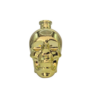 Bouteille à liqueur en verre fantaisie vide de 750 ml en forme de visage avec bouchon doré électrolytique personnalisé pour whisky, <span class=keywords><strong>tequila</strong></span>, vodka – Vente en gros - Product Image 3