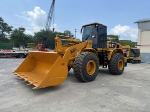 Chargeurs frontaux d'occasion d'origine du Japon presque neufs CAT966H 966G 966F Chargeur frontal hydraulique à roues avant en bon état - Product Image 4