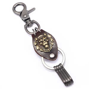 Llavero de cuero con cabeza de león tallada en metal, forma ovalada, color plata antigua y bronce, para colgante de coche. - Product Image 5