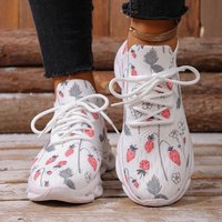 Les nouvelles baskets décontractées à motif graffiti fraise sont des baskets décontractées et confortables à semelle épaisse et à lacets sur le devant
