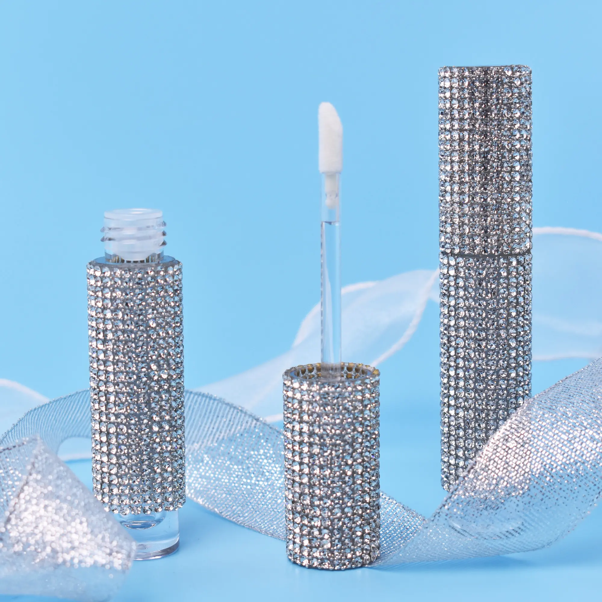 Fabricant de tubes de brillant à lèvres en PETG avec logo personnalisé brillant Rangement des cosmétiques Teinture à lèvres pratique avec pinceau