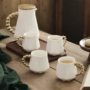 Solhui Luxus weiß Keramik Wasserkocher Set Wohnzimmer Teese rvice mit Tablett hitze beständige Tee Kaffeetasse Set mit Gold griff