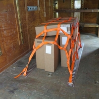 Filet de barrière de chargement professionnel E-Track en sangle de polyester robuste pour la sécurisation des charges de camions