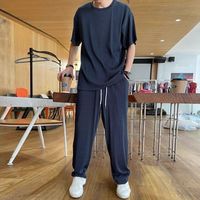 À la mode glace soie tricoté sans couture sport costume été mince 2025 nouvelle dose lâche hommes respirant pantalons décontractés
