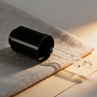 Flacon compte-gouttes en verre transparent avec bouton poussoir rotatif pour sérum