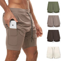 Shorts de sport double couche pour hommes, taille élastique, séchage rapide, maille légère, pour athlétisme et basketball, motif uni