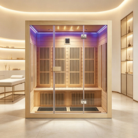 Salle de sauna infrarouge lointain avec structure en bois de pruche et cabine en verre, sauna intérieur personnalisé pour hôtel, spa et centre de bien-être