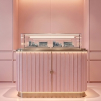 Vitrine à bijoux élégante, murale, durable, de haute qualité, en acrylique avec dôme en verre, éclairage LED, rose doré