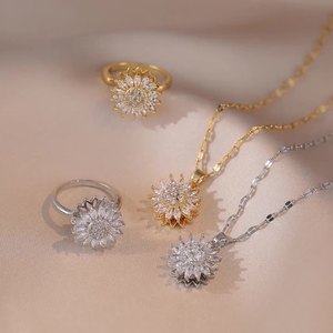 新しい到着回転可能なダイヤモンドひまわりブレスレットイヤリング回転襟チェーンネックレスリング女性のためのジュエリーセット - Product Image 1