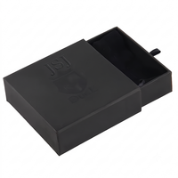 Boîte à tiroirs pour soins de la peau en noir mat de luxe avec pochette en velours pour sérum haut de gamme et coffret cadeau cosmétique de boutique