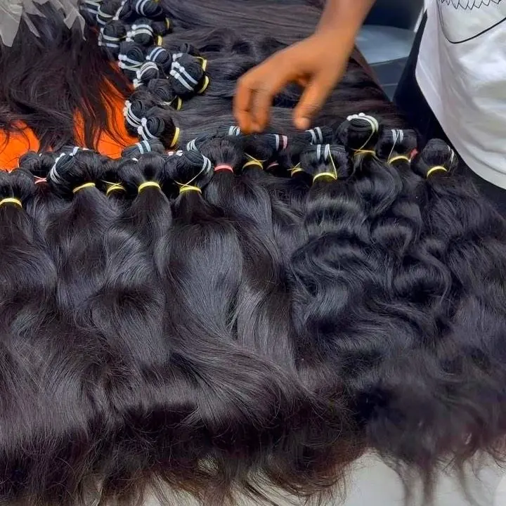 Paquete de extensión de cabello humano indio al por mayor de cabello Remy indio crudo, paquete de cabello camboyano crudo, paquete de cabello indio de proveedor indio