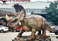 Robot dinosaure animatronique réaliste sur mesure, thème parc d'attractions aux couleurs vives, modèle de dinosaure