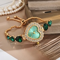 Montre-bracelet pour femme en alliage de quartz, exquise et mignonne, en forme de cœur, écologique, tendance, décontractée, luxueuse, avec aiguilles incrustées de diamants