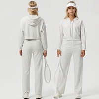 Ensemble de survêtement athlétique décontracté pour femme avec logo personnalisé, comprenant un sweat à capuche court à demi-zip et un pantalon droit taille haute, idéal pour le yoga (OEM)