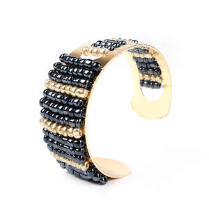 Bracelet tressé plaqué or style punk, très tendance, avec contraste de couleurs unique et design de tissage mica à la mode - Product Image 1