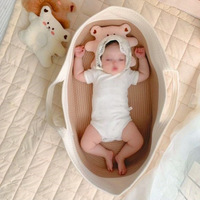 Nouvelle Station de change portable pour bébé, tapis imperméable imprimé, double poignée, panier de couchage en corde de coton, style minimaliste, forme ovale