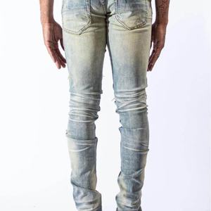 กางเกงยีนส์เดนิมทรงสกินนี่สีน้ำเงินแบบวินเทจ ดีไซน์เนอร์คุณภาพสูง ขายส่ง แบบสั่งทำพิเศษ ขาดเซอร์ๆ แต่งผ้าปะติดปะต่อ สำหรับผู้ชาย - Product Image 5