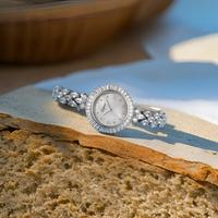 Montre à quartz de luxe pour femme, nouveau design, affichage analogique, boîtier en acier inoxydable, batterie d'une durée d'un an