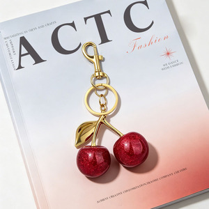 จี้กระเป๋าผู้หญิงรูปเชอร์รี่คริสตัลสีแดงสวยหรูคุณภาพสูง พวงกุญแจ - Product Image 1
