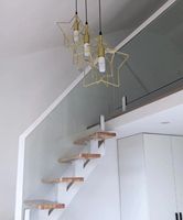 Escalier flottant en bois de chêne américain ECT 2026 avec monopoutre et garde-corps en acier au carbone