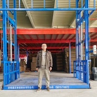 Monte-charge vertical hydraulique industriel personnalisé à commande électrique à distance en acier haute résistance pour entrepôt