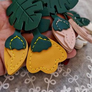 Cute Tropical Monstera Leaf <b>Bag</b> <b>Charm</b> Personalized PU Leather Flower <b>Bag</b> <b>Charm</b> French Goat Leather Keychain for Gifts - Product Image 2