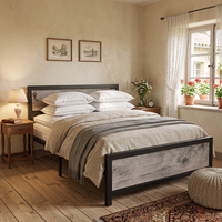 Cadre de lit moderne en métal durable avec panneaux en bois grainé inclinables, espace de rangement et sommier à lattes ouvertes pour chambre d'hôtel pleine grandeur
