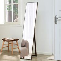 Miroir sur pied contemporain en métal argenté décoratif et élégant, personnalisable, tendance pour le salon, 2025