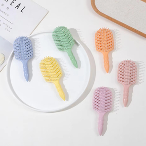 Vente en gros de mini brosse à cheveux personnalisée pour bébé démêlant produit de lissage avec logo en nylon pour enfants avec évent - Product Image 3