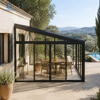 Véranda en verre sur mesure avec rupture de pont thermique en aluminium et vitrage isolant pour balcon et terrasse résidentiels