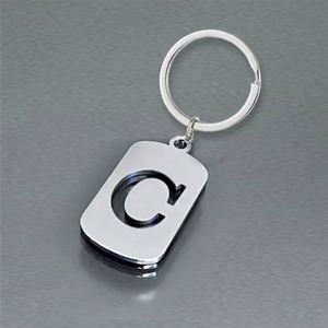 Porte-clés en acier inoxydable poli avec 26 lettres, porte-clés creux en forme d'alphabet pour clés de voiture, breloque de sac à dos et cadeaux promotionnels - Product Image 2