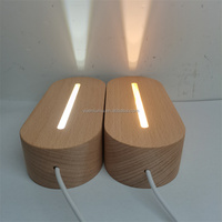 Base de veilleuse ronde en plastique ABS de sortie d'usine blanche avec multicolore pour lampe en bois acrylique Design minimaliste pour salon