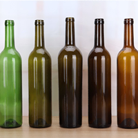Botella de vino de vidrio de calidad superior de fábrica de China Botella de vino de color transparente en stock