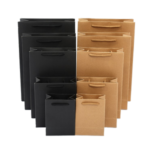 Sac en papier couché personnalisé en gros avec logo sérigraphié, poignée longue, en matériaux recyclés, pour emballage de bijoux et cadeaux - Product Image 1