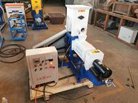 Extrudeuse de traitement de granulés d'aliments secs et humides pour animaux de compagnie Chien Poisson Chat Poulet Machine de fabrication de granulés d'aliments pour animaux Moteur Composant central