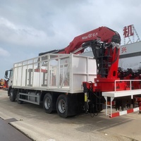 Camion-grue articulée hydraulique HOWO 8x4 de 16 tonnes avec grappin à briques pour le levage de matériaux de construction