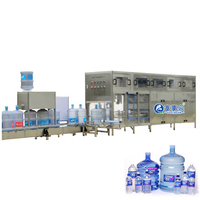 Machine automatique de remplissage d'eau minérale en bouteilles PET de 19L, 20L et 5 gallons