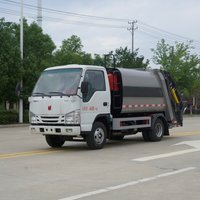 Camion à ordures diesel de compacteur de transmission manuelle d'ISUZU 4x2 nouvel état utilisé de 5.3 mètres cubes pour l'assainissement de construction