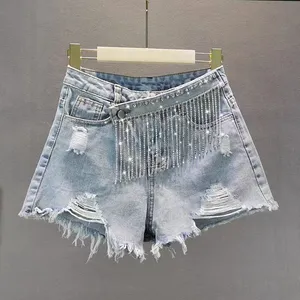 Shorts en <span class=keywords><strong>jean</strong></span> élégants pour femmes, à franges <span class=keywords><strong>et</strong></span> perles, taille haute, coupe large, couleur unie, décontractés, nouvelle collection printemps-été 2023 - Product Image 1